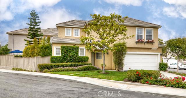 DETACHED CHARMING home, feels like a Single Family Residence, the home is on a PREMIUM lot with its own private driveway! This corner unit located on a Cul-de-sac, provides the privacy you desire in the desirable neighborhood of Magnolia Lane. The spacious 3 bedroom/2.5 bath home features an open floor plan with beautiful porcelain tile throughout the living room, dining area and kitchen in warm colors, direct access to a cozy private backyard beautifully hardscape with deck, as well as an attached 2 car garage with built-in cabinets. Upstairs, you will find a spacious master bedroom complete with a walk-in closet upgraded with a closet organizer and attached private master bathroom with travertine flooring and dual vanity. Conveniently located close to highly rated award winning schools, community pools and parks, this home is a must see!