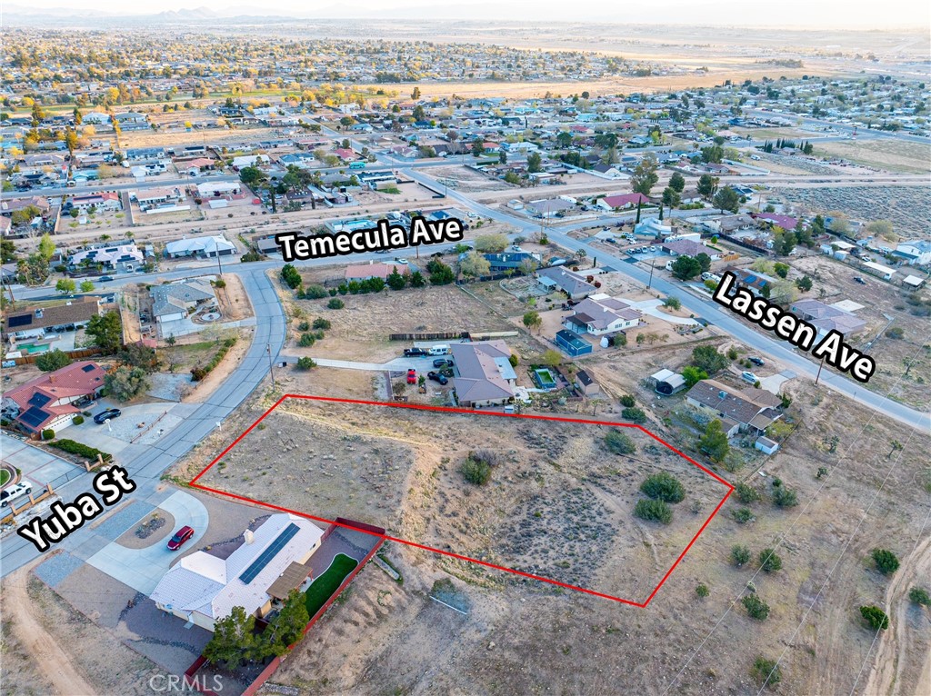 Welcome to The Mesa!
This prime location in the beautiful city of Hesperia offers everything you're looking for to build your dream home. Situated on a spacious 43,000 sq. ft. lot, you'll enjoy stunning views of the local mountains and plenty of room for all your animals.
Conveniently located just minutes from shopping centers and schools, this lot is ideal for families and those seeking both space and accessibility. Utilities, including water and power, are available at the street—making it even easier to get started.
Did we mention the views? Come take a look—you won’t be disappointed!
