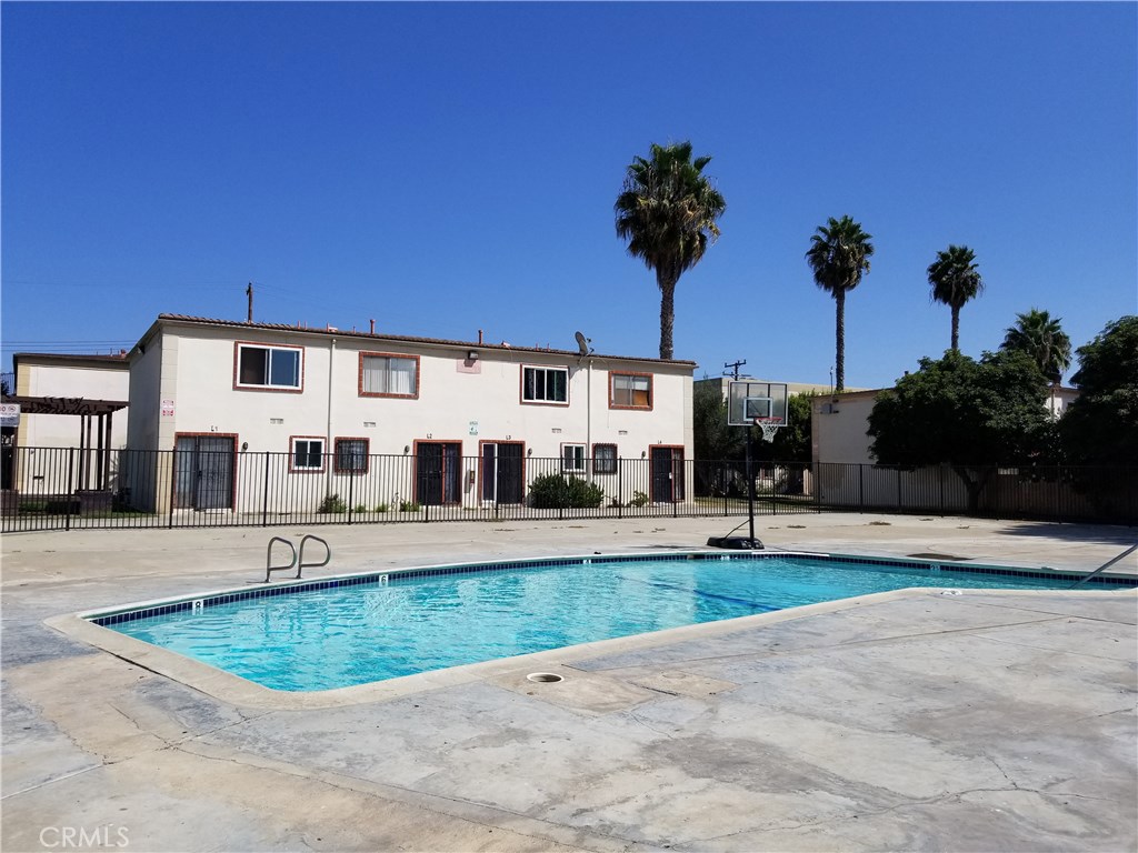 PRICE REDUCTION!! Place to invest or stop paying rent, this unit has two bedrooms one full bathroom upstairs and half bathroom downstairs and rear patio with sliding door. HOA offers playgrounds. Club house.Two swimming pools. BBQ area laundry facilities.HOA covers water and trash. Convenient location close to Schools, Shopping, Public Transportation and easy access to the main Freeways in Orange County. Don't miss to see this Opportunity.