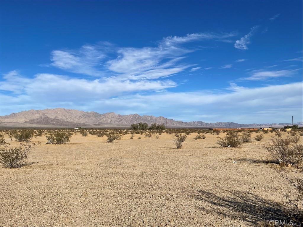 Beautiful views of Wonder Valley from this 5-acre parcel. Located north of Amboy Rd., east of Shannon. Power appears to be on Shannon Rd. and Naborly Rd,, Buyer to investigate. Wonder Valley rural neighborhood of cabins surround parcel, near the popular Palms Restaurant. Completely off-grid, spectacular views all around. 25 miles from Joshua Tree National Park, 29 Palms entrance. Invest in desert property in a super popular area, create an off-grid campsite for family and friends, near one of the most popular national parks in the nation.