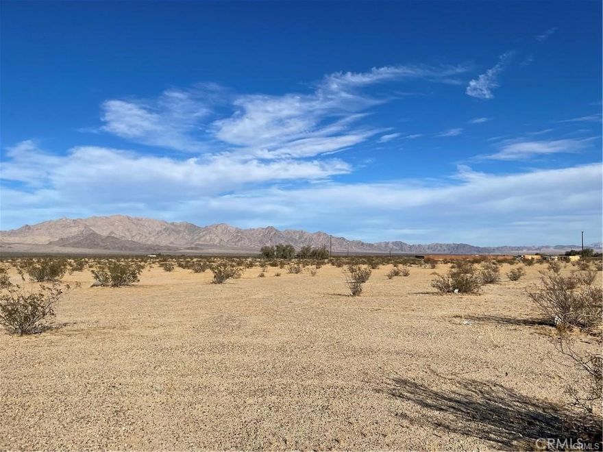 Beautiful views of Wonder Valley from this 5-acre parcel. Located north of Amboy Rd., east of Shannon. Power appears to be on Shannon Rd. and Naborly Rd,, Buyer to investigate. Wonder Valley rural neighborhood of cabins surround parcel, near the popular Palms Restaurant. Completely off-grid, spectacular views all around. 25 miles from Joshua Tree National Park, 29 Palms entrance. Invest in desert property in a super popular area, create an off-grid campsite for family and friends, near one of the most popular national parks in the nation.
