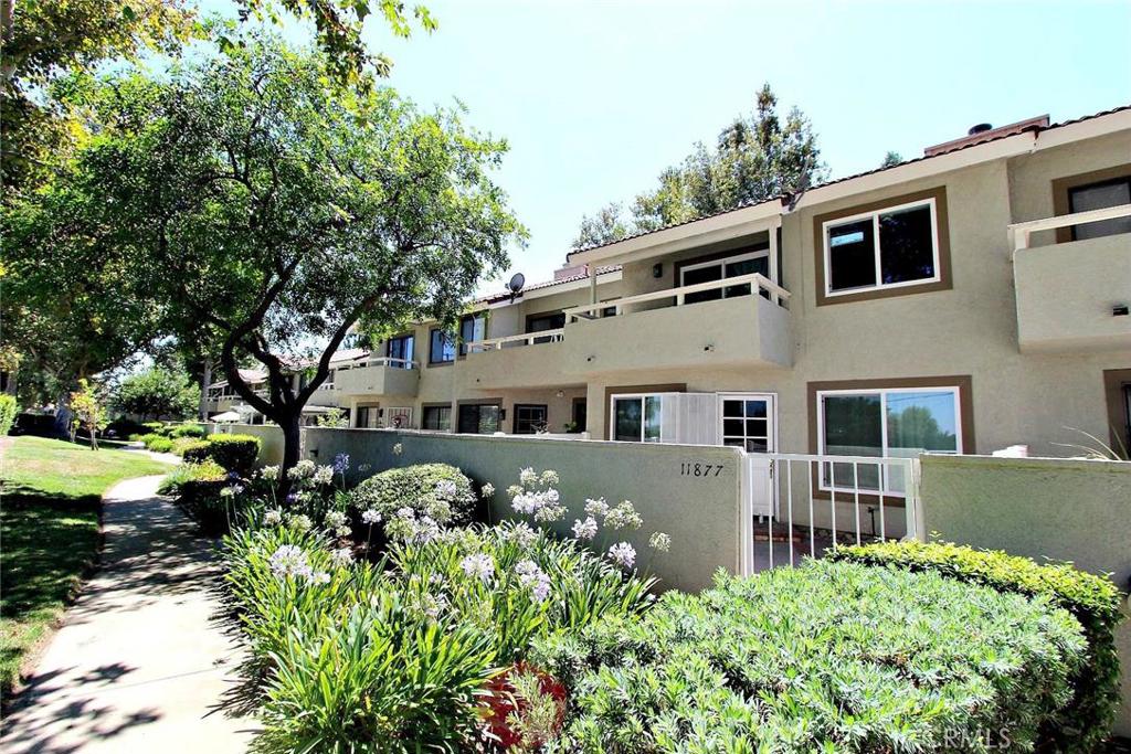 This fabulous 2b 2.5b cute condo has been fully remodeled about one year ago: New laminate flooring throughout the house, New painting, New Kitchen, all three bathrooms (two full bath upstairs, one half downstairs) are brand new from last year! Attached two car garage. Two MASTER suites upstairs! Each comes with a nice patio! And there is a decent size front yard! Its located in a gated community, equipped with Swimming pool and Play ground. Conveniently located to near school, shopping centers. A great place for first time home buyer and small to median family. Priced to sell! A must see!