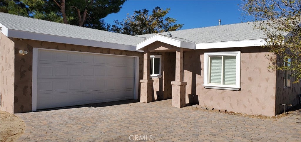 10645 E Avenue R12
