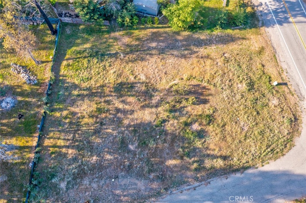 Build a home on this improved parcel in Bass Lake Heights! This property is over 1/3 of an acre at the 3750 foot elevation. This lot has recently been improved with a new septic system installed plus there is a water system, the power is there. Build your dream home, second home or investment property, so much of the work has been done! Buyer to investigate and confirm permit progress. Some of the photos were taken prior to the more recent grading.