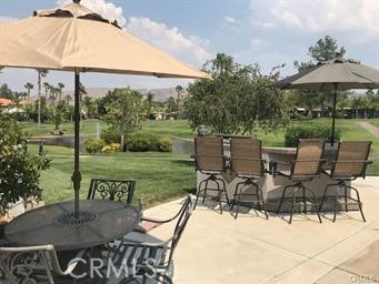 This Golf Course View property has so much to offer. It sits on the 11th hole with a pond view. Palm trees and sago's line the north side of the property. Lots of space to take in the fresh air and watch the golfers tee off and bask in the water views. Built-in BBQ Island and a small refrigerator included with table, chairs and a couple of loungers to relax and enjoy. The views are overlooking the golf course and pond with fountain. Included in Rancho California RV Resort is a 14 hole Executive Golf Course that is free for owners, 5 Pools and Jacuzzi areas, Tennis Courts, Pickle Ball Courts, Laundry Rooms, Dog Park, Horse Shoe Lawn, Club House, Hiking Trails, all inside Gated Community that is Guarded 24/7. Use this site for yourself or rent your space. Peace and quiet serenity all just 25 minutes from Temecula Wine Country. No age restrictions. Come on over and check this hidden gem of a place out. Financing Available!!!!