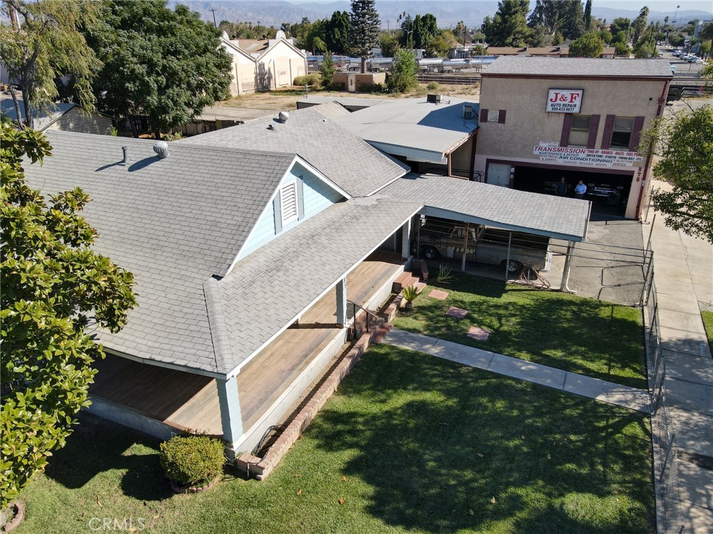 Here’s your chance to own a thriving business and residence in one! This prime corner lot property combines a fully equipped auto repair workshop with a comfortable, spacious home, offering both residential charm and commercial potential. The business boasts a well-designed downstairs reception area that opens directly into a large garage—perfect for running a successful auto repair operation. The garage includes a restroom for clients and employees, ensuring convenience and practicality. Above the business area, an upstairs loft with a chimney and restroom creates a cozy, independent space, ideal for a lounge or additional office area. Adjacent to the workshop, the 3-bedroom, 2-bathroom home provides a welcoming and private retreat. Spread over 3,572 square feet, the home’s gated front yard showcases a lush landscape with trees and grass, while the backyard offers a more intimate space with a wooden fence for added privacy. This property’s corner location not only boosts business visibility but also enhances the home’s appeal, making it a rare opportunity to seamlessly blend work and life in one exceptional property.
THIS PROPERTY IS BEING SOLD ALONG SIDE BUSINESS OPPORTUNITY (CV24229136). THE SELLER IS SELLING THE AUTO REPAIR BUSINESS WITH EVERYTHING INCLUDED BESIDES PERSONAL TOOLS.
