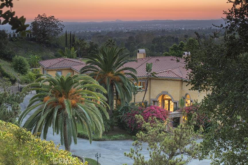Huge Price Reduction! Reduced over $1,000,000 for quick sale. The estate sits on park-like grounds, approximately 4.16 acres behind the prestigious guard gated "Bradbury Estates" with 24 hour security. The property offers breathtaking panoramic views of Los Angeles City, valley, ocean and mountain. Over 8,399 sq ft of living space with 6 bedrooms and 8 1/2 bathrooms, and 3 fireplaces. Built in 1998. Circular driveway, stunning grand high ceiling foyer, elegant circular wrought iron staircase, and marble floor throughout downstairs, hardwood floor and carpet upstairs. Luxurious master suite with spacious retreat and cozy fireplace, a wall of window and two pairs of French doors opening to the wrap around balcony with stunning view. Delight in the craftsman details around the residence including the artist hand painted walls of the master suite and powder room. Two individual laundry rooms. 4 car attached garage with two large walk in storage rooms. Backyard with pool and spa, cabana with built in barbecue, private trail, pond, outdoor surround sound, mature fruit trees and spectacular views. Property need TLC. Property to be sold in its "as is" condition.