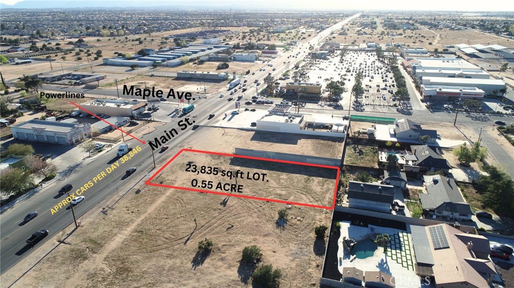 Prime Location for your Commercial Business or development in the growing city of Hesperia. This is an excellent opportunity to own a premium 23,835 sq.ft. lot located on a high visibility traffic corridor. This commercial lot is the 2nd lot from the Mobil Gas Station on on Maple Ave with 1 block wall on one side in the north side of Main/Maple. This lot has over 100 feet frontage on Main St., it is leveled with utilities at the street. The Main Street corridor at Maple Ave sees approximately 38,846 cars per day, lots of traffic ideal for your small business or future development and it is conveniently about 3 miles east of the I-15 freeway. Perfect for the savvy investor to build now or in the future or just hold to gain equity, the corner of Maple St & Main is a busy area in city of Hesperia. Adjacent to popular gas stations, right across from 7/11 & a highly trafficked shopping center that features major anchor tenants like Stater Bros, Auto Zone, McDonalds, El Pollo Loco. The newer Walmart on Main and Escondido is within a close distance too and all other type of businesses. Hesperia High School is within walking distance. The High Desert is now the future home of the recently approved High Speed Train from Apple Valley to Las Vegas and to the south to Rancho Cucamonga. The project is expected to break ground in the Victor Valley soon and be completed in over the course of the next few years, this projected is expected to bring in jobs and boost the economy of the High Desert.