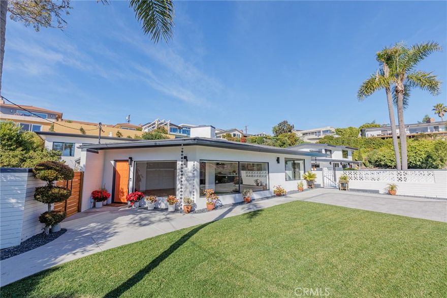 This is a beautiful and serene property that has recently been updated and is situated in the desirable Muirlands neighborhood of La Jolla. The south facing exposure bathes the rooms with a golden warmth and light. Views from the property include city, bay, island and ocean views by day and city lights at night. This multi-generational house is located on a spacious flat lot (25,700 square feet), which is rare in this south facing neighborhood. In addition, this home has the included amenities of a pool and tennis/sports court. It is located on a quiet cul de sac with biking and short driving distance to the beaches, as well as, to the upscale venues of La Jolla and Bird Rock.