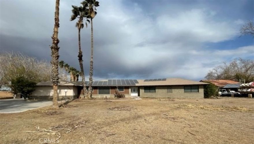 Great custom home on a great lot. No neighbors on one  side and views from the front and back of this property for miles. Property has paid solar, pool and newer roof.