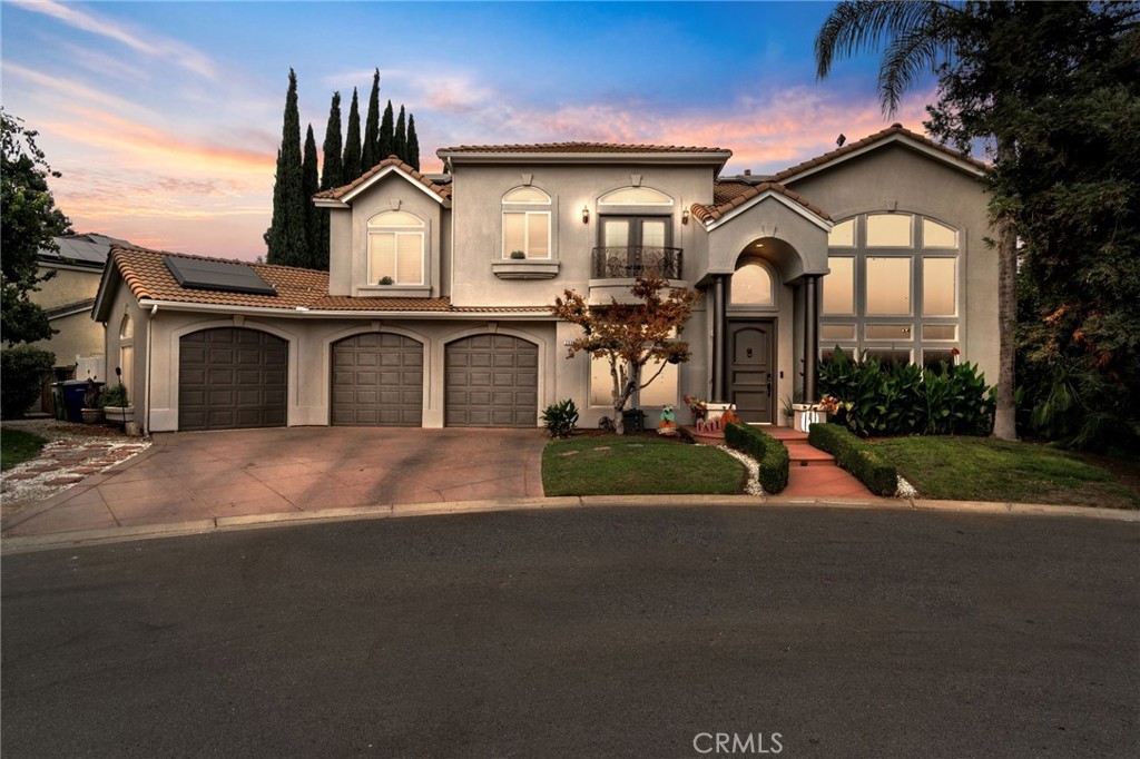 SHORTSALE OPPORTUNITY! Welcome to this custom masterpiece, where luxury and elegance blend seamlessly. The home greets you with dramatic, towering windows that nearly stretch from floor to ceiling, flooding the space with natural light and framing the grand entryway. Marble floors and a stunning marble staircase ascend beneath soaring ceilings accented by soft taupe tones and stately pillars.
Step into the gourmet kitchen, where custom cabinetry, a crystal chandelier, and granite countertops are beautifully complemented by four layers of crown molding. This space flows effortlessly into the living room, featuring built-ins and a cozy fireplace, perfect for gatherings or relaxation.
Upstairs, the first bedroom opens to a private balcony through French doors, complete with an ensuite bathroom. Two additional bedrooms share a thoughtfully designed Jack-and-Jill bathroom. The primary suite, set behind elegant double doors, is a sanctuary with its own fireplace, spa-like bathroom featuring a soaking tub, dual vanities, and two expansive walk-in closets.
For added convenience, an upstairs laundry room awaits, along with a versatile garage space ideal for a workshop or gym.
Outside, the backyard oasis invites you to unwind by the sparkling pool, complete with a cascading waterfall. Throughout the home, luxurious finishes, including marble accents in the guest powder room, create a sense of timeless sophistication.
This home provides a truly unique and lavish living experience—an exquisite blend of comfort, style, and grandeur