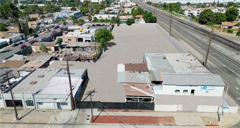 Photo of 1132 W 1st Street, Pomona, CA 91766 (MLS # CV24167136)