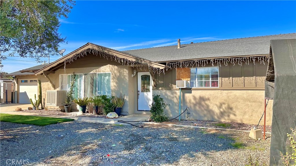 Introducing a unique opportunity to own two parcels totaling nearly 5 acres, currently home to a thriving nursery. This versatile property offers dual access, with two separate entrances from the street, ensuring ease of use.
The first parcel (325-050-029/0.83 acres) features a single-family residence, perfectly set atop the highest point of the property, offering unobstructed expansive panoramic hillside and mountainous views like Mt. San Jacinto and even snow capped Big Bear (pictured in one of the photographs). The home’s backyard is fully fenced, providing a private and secure space separate from the rest of the land where you can let your pets and your kids run free.
The second parcel (325-050-028/4.05 acres) sits just behind the home and includes a permitted water well with its own dedicated electricity meter. According to the seller, the well is fully operational and has worked like a dream. The large parcel of land is Fully stocked with trees and a complete irrigation system, this land is primed for continued nursery operations or other agricultural ventures. ***Located in a highly highly HIGHLY desirable rural area,*** the property enjoys paved road access and is conveniently close to both Highway 74 and Cajalco Rd, offering both tranquility, connectivity and accessibility.