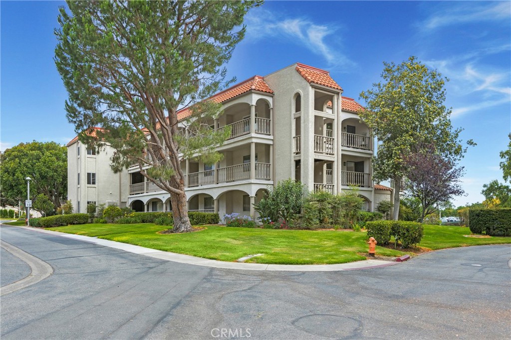 Welcome to Laguna Woods Village! WOW! Newly installed flooring and carpeting as well as a fresh coat of paint make this three bedroom, two bathroom unit move in ready!! The open floor plan and wonderful view add the final touches for easy resort style living. Sellers have just installed a new stove and microwave as well as updated lighting in the kitchen. Enjoy early morning coffee or sunset dinners while overlooking the lush greenbelt from your private enclosed balcony! Not only is it conveniently located steps away from the laundry room and elevator, Clubhouse 5 is across the greenbelt where swimming, exercise classes, and entertainment awaits. Laguna Woods Village boasts Country Club living at it's Best with 27 holes of championship golf, a 9 hole par 3 golf course, tennis, paddle tennis, pickle ball, lawn bowling, 3 fitness centers, 7 clubhouses, 5 swimming pools, equestrian center, gardening centers, art studio and over 200 social clubs. The Village offers free bus transportation around the community and nearby shopping, and has RV parking for an additional fee. Located approximately 7 miles from Laguna Beach, known for it's coastline and art, there is something for everyone to enjoy in this resort-style community.