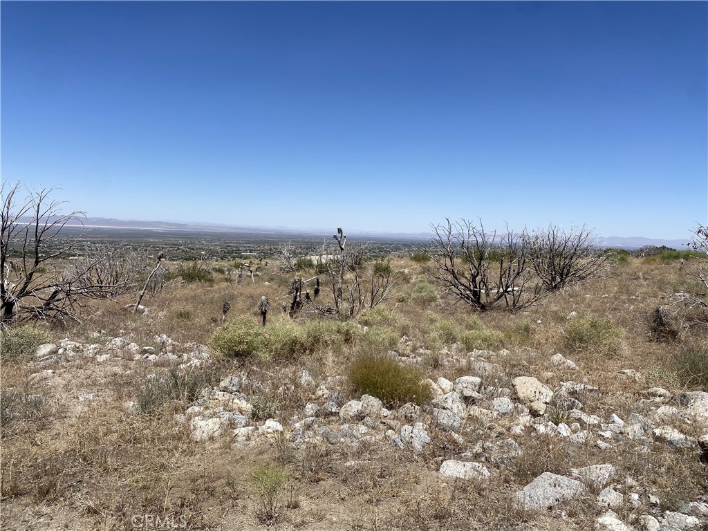 Discover the boundless potential of this expansive parcel on E Avenue Z in Llano, California. This property offers a unique opportunity for development, investment, or creating your dream retreat in the serene high desert landscape. This vast piece of land is a blank canvas, ready to accommodate a variety of visions, whether it’s residential development, agricultural pursuits, or an investment project. With its flat and usable terrain, the property is well-suited for building and development, providing a straightforward path to bringing your ideas to life.
Situated in the tranquil and picturesque community of Llano, this property boasts stunning views of the surrounding desert and mountains, offering a peaceful and inspiring environment. The location ensures a perfect balance of seclusion and accessibility, with nearby highways providing easy access to neighboring towns and amenities.
In addition to its natural beauty, this land is an excellent investment opportunity, with the area experiencing steady growth and development. Utilities are nearby, making it easier to plan and execute your project.
Don’t miss out on this rare opportunity to own a substantial piece of Llano’s landscape. Whether you’re looking to build your dream home, start a new venture, or invest in the future, this property on E Avenue Z offers endless possibilities.
Contact us today for more information and to schedule a viewing.