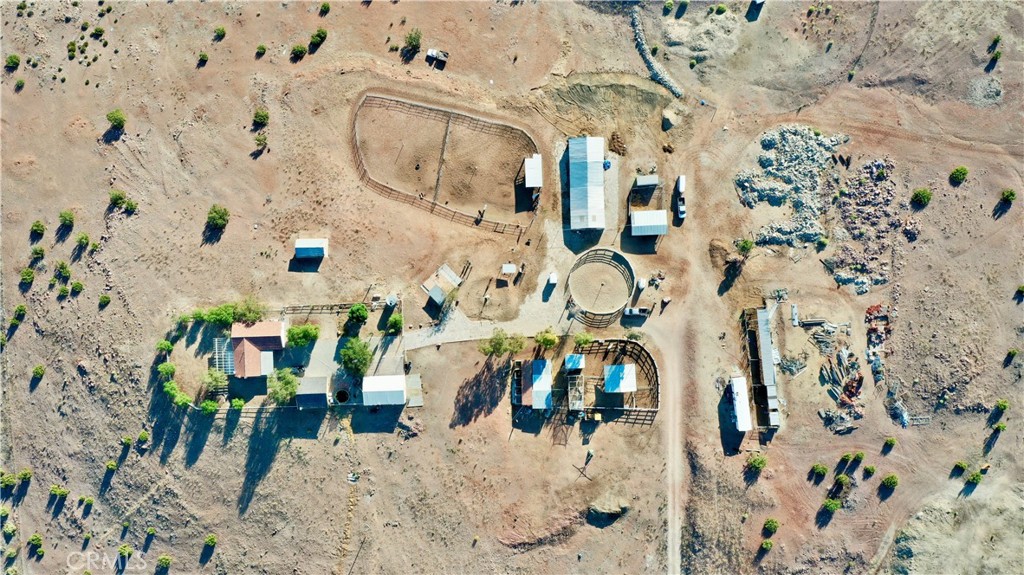 Moonshadow Ranch Retreat - A Picturesque 44-Acre Horse Property
Discover the serenity of country living at 2215 Moonshadow Ranch Rd. This expansive 44-acre ranch presents a unique opportunity to embrace a peaceful lifestyle within reach of city conveniences. Comprising two parcels, this property has enough room for unlimited possibilities.
Features:
Acreage: Sprawling across 44 acres, this ranch offers ample space for equestrian pursuits, agricultural endeavors, or simply enjoying the tranquility of wide-open spaces.
City Views: Capture the essence of Palmdale with stunning views from the property. Whether at sunrise or under the starlit night sky, the city lights create a captivating backdrop.
Residence: The cozy 2-bedroom, 1-bathroom home spans 1,584 sqft, providing a comfortable and inviting living space.
Versatility: With two parcels, this property offers versatility for potential development, expansion, or the creation of your dream equestrian estate.
Country Living, City Proximity: Experience the best of both worlds — enjoy the peacefulness of rural life while being conveniently located near the amenities and services of Palmdale.
This property presents an excellent opportunity for those seeking a spacious retreat or an investment in California's captivating landscape.
Don't miss the chance to make Moonshadow Ranch your own. Whether you envision a private sanctuary, an equestrian haven, or a future development project, this property invites you to explore the possibilities of country living in the heart of Southern California.
Schedule a viewing today and let Moonshadow Ranch capture your imagination.
Seller and Seller's Broker do not guarantee any information regarding property, square footage, use, zoning, or any other factor of the property. Buyer and buyer's broker to do their own due diligence and satisfy themselves.