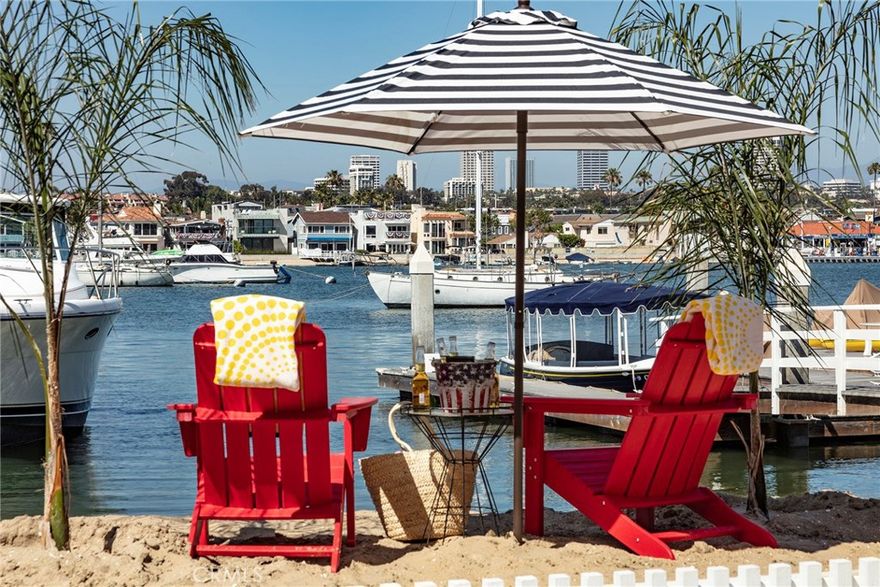 Experience the finest of coastal living in beautiful Newport Beach with the sand at your doorstep, ocean breezes and world-class amenities just minutes away. This prime Balboa Peninsula Bayfront location is situated on a corner double lot with 100&#8217; of private white sand beach, a private dock, and 4 large boat slips. 405 Edgewater Avenue presents a rare opportunity to own a family compound consisting of 2 attached homes that are perfectly positioned with dramatic views of the bay, Balboa Island and Newport Beach city lights. Sited on a 7100&#8217; lot with over 4800&#8217; of living space. The compound has recently been remodeled with hardwood flooring and granite countertops throughout. A large 4 bedroom, 2 bath, owners quarters with floor to ceiling glass and a large front patio. A beautiful 2 bedroom, 2 bath mother-in-law quarters below and 2 attached spacious studios for the kids. 3 enclosed attached garages offering parking for 5 cars and 2 outside designated parking spaces. 3 bayfront patios and seating area on the dock is sure to provide extensive outside entertainment and relaxation areas. This exceptional property would be the perfect primary residence, a wonderful beach house, great investment property or an extraordinary family compound. Don&#8217;t miss this once in a lifetime opportunity!