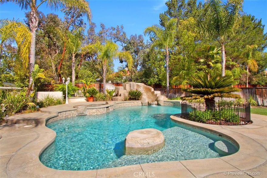 This Fantastic Five Bedroom Pool Home with Dual Masters Suites plus Bonus Room will not last long. This home is light and bright with an open floor plan that is ideal for family gatherings. Spacious living room area with Cathedral Ceilings , beautiful laminate floors, cozy family room with breakfast area and open kitchen look onto the amazing backyard paradise. Custom Pool with Rock Slide and Waterfalls with  backyard BBQ and Fire Pit this is the perfect place for entertaining. Plantation Shutters throughout the home and a large bonus or game room upstairs for school studies or just playing video games this room is ideal for the whole family. Located on a quiet cul-de-sac with fantastic curb appeal, large driveway for extra cars and an over sized 3-car garage. Don't miss this beauty with NO HOA and Low Taxes this will not last long. Close to restaurants and shopping, great schools and Fantastic Neighborhood!!