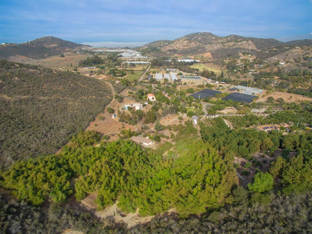 Panoramic views of Twin Oaks Valley! Gated entry. This beautiful property offers privacy and working well, city water and an arrangement of fruit trees, including; avocado, peach, pear, apricot, plum, lemon, orange, grapes, apple and others. This is a green thumbs dream! Home does need some TLC but offers incredible views and opportunities to expand on or build your dream home! Close to shopping, restaurants, schools and more! Neighborhoods: Twin Oaks Valley Equipment: Garage Door Opener, Range/Oven Other Fees: 0 Sewer: Septic Installed Topography: ,GSL