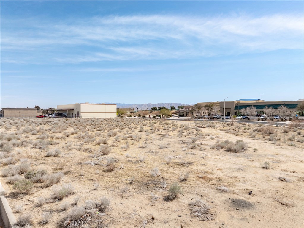 General Commercial C-2 Zoned Lot - Ideal location for an office, medical or dental office. This property is located near Desert Valley Hospital and Victor Valley College, just east of the 15 Freeway. The site is just under 1 acre and has street, curb, and sidewalk improvements.