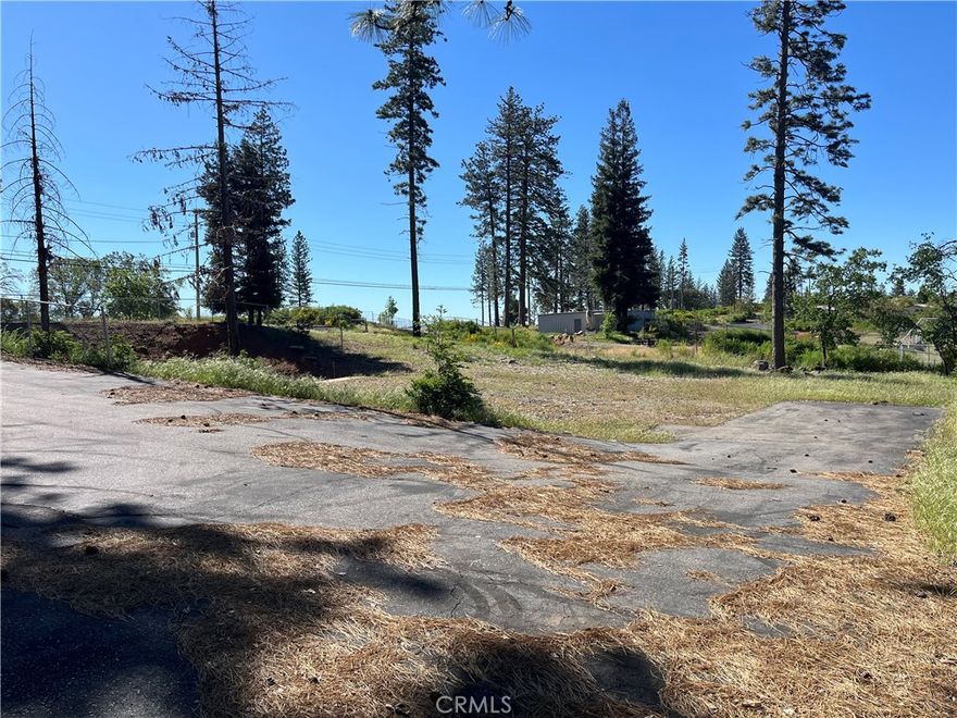150+ FT. of Skyway frontage. .7 AC. commercial parcel. Beautiful view at Sawmill Peak. Existing asphalt parking area and driveway.