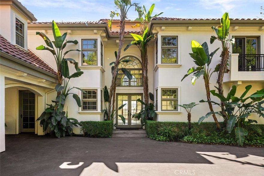 Built with superb craftsmanship, this secluded Mediterranean haven, set amid verdant landscapes with breathtaking views of Canyon Oaks Country Club, spares no expense when it comes to custom detail. This remarkable estate offers an extraordinary blend of elegance and comfort, promising a living experience like no other. Upon entering through the grand double doors, you’ll be welcomed by an abundance of sunlight pouring in through expansive arched Lowen windows that fill the home with warmth, soaring ceilings, lightly painted walls and an expansive formal seating area that is perfect for entertaining. Take gourmet to the next level in this fully equipped kitchen. It offers beautiful cherry wood custom cabinetry, granite countertops, a top notch 6-burner Wolf cooktop, two Sub-Zero refrigerators, dual Bosch dishwashers, a nicely sized center island with a vegetable sink and a breakfast bar to enjoy a quick snack. The home features four spacious bedrooms and four luxurious bathrooms, providing ample room for family and guests to unwind in style. The primary suite is an oasis of tranquility, offering stunning views and premium amenities. The spa-like en-suite bathroom is a true escape, with a soaking tub and a walk-in shower with multiple shower heads. The upper level includes a versatile sitting area, ideal for gathering or relaxing. Head to the lower level of this villa and unlock endless potential. Whether you dream of creating a personal gym, a private theater, or a deluxe guest suite with its own entrance, this space is designed to suit your needs. Outside, you’ll find your own private oasis. Dive into the custom-designed pool, glide down the water slide, or relax on the beach entry or in the bubbling hot tub. The expansive backyard is also perfect for outdoor entertaining, surrounded by lush scenery that adds a perfect backdrop to any gathering. If you're looking for some fun, hop on your golf cart for a quick trip to the clubhouse for a meal or a friendly round of golf. Tucked behind lush landscaping is a solar array that adds an eco-friendly touch to the property while also helping save on your energy bills. This Mediterranean villa is more than a residence—it's a lifestyle. Experience ultimate luxury in this serene retreat, where every aspect has been thoughtfully designed for your comfort and pleasure.