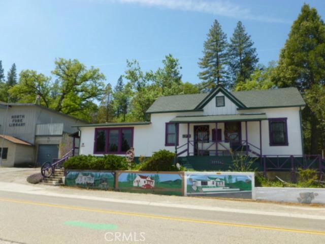 Historic Stage Stop building in North Fork. Great Main Street location. Over sized lot with rear parking. 6 rooms and 2 restrooms. Lots of character! Would make a great gift, coffee or antique shop or even an office. 2 porches and an outside covered area. Water and sewer.