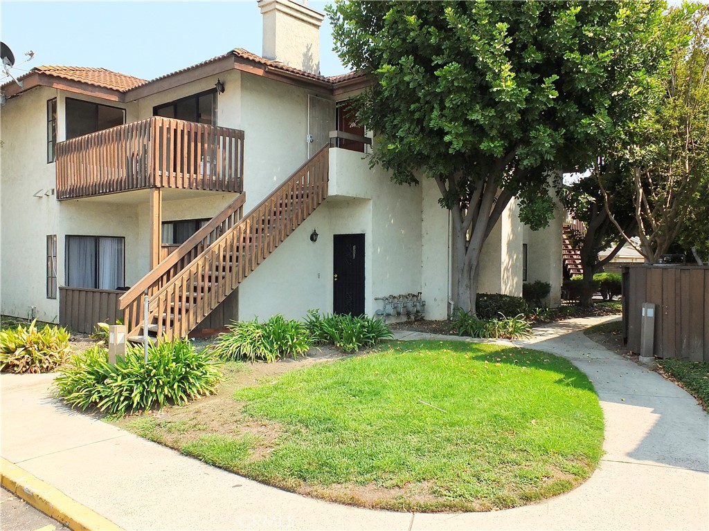 Great Spacious Condo Retreat - Ready to Move In with 2 Bedroom/2 Bath Condo, 2 Car Detached Garage!!! Freshly Painted, Remodeled Upper Unit Corner Unit with Updated Kitchen with Quartz Counter & Newer Appliances, Hardwood Floors, Fireplace, Central Air, Vaulted ceilings and Two Large Balconies as well as Inside Laundry. Condo also has access to additional Five Visitor Parkings right in front of the unit. Association Dues Include Water, Trash and Insurance. Gated Community includes a Pool, Club House and Tennis Courts with terrific walking paths to enjoy the woodsy outdoors. Conveniently situated in the Heart of Garden Grove! Minutes from the 22 fwy, Restaurants, Entertainment & Shopping!!!