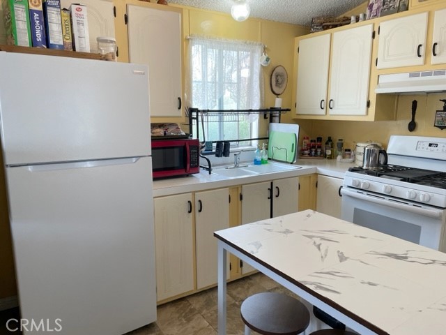 Photo 11 of 32 of 21210 W Arrow Highway 111 mobile home