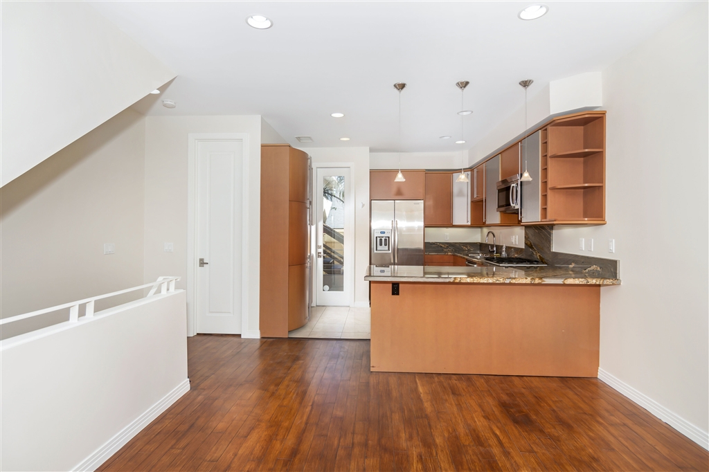 Sleek contemporary designed row home in the heart of Hillcrest. Wood flooring, Euro-influenced kitchen, high-end appliances, spa-like baths and 4 balconies makes this the perfect pied-a-terre. Dramatic master bedroom is designed like a loft complete with city views and a cozy fireplace on the deck off the master. The home is turn-key and offers a two car tandem garage that is stubbed for a bath...perfect for a wood space, workout studio area, or office. Truly a unique opportunity not to be missed! Neighborhoods: Hillcrest Equipment: Dryer,Garage Door Opener, Range/Oven, Washer Other Fees: 0 Sewer: Sewer Connected Topography: LL