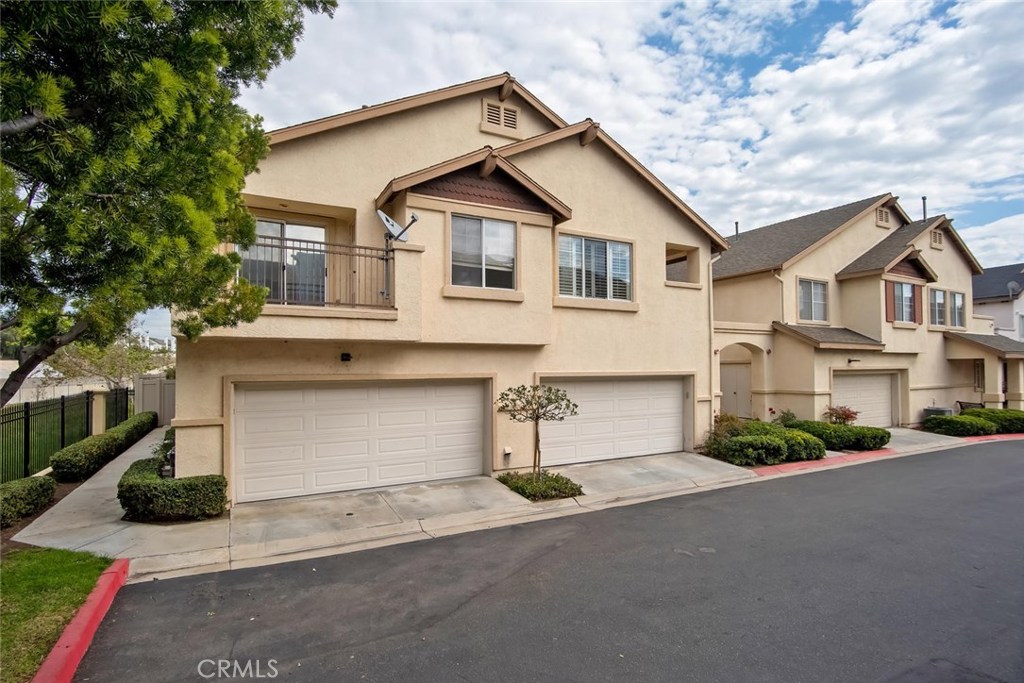 Welcome to the beautiful gated Community of Westbury in the City of Orange. This light and bright upper Unit has an open floor plan with high vaulted ceilings. The Home offers 2 Bedrooms and 2 Full Bathrooms all on the same level. The Master Suite features ceiling fan, a large walk-in closet, a private deck, and beautiful unobstructed view of the Santiago Creek Bike Trail. Kitchen showcases newly custom backsplash, Kitchen Aid side by side refrigerator, range with oven, and a microwave. The Kitchen opens up to the cozy Living Room and Dining area with ceiling fan. Carpet and plantation shutters throughout. Fresh paint! Well-maintained Home with oversized detached 2 car Garage. Westbury HOA amenities offer 2 Community Pools, Spas, and a Clubhouse. Easy access to Dining, Shopping, and major Freeways. Located near Grijalva Community Sports Park and Santiago Creek Bike Trail. Close proximity to Chapman University and Old Towne Orange. A MUST SEE!!