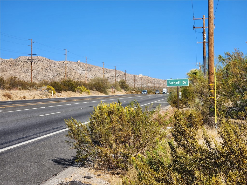 5.5 Acres (APN: 0585-232-10 & 0585-232-17) GPS: 34.09864, -116.50184 This VIEW lot is located in Morongo Valley, CA. This property has BEAUTIFUL views over the valley. The city of Morongo Valley has zoned the property as 'Morongo Valley / Rural Living' (MV/RL). The listing includes two parcels, a 3.6 acre and 1.8 acre parcel. Two small foundations exist on the property. Overhead power is available on the property. Nestled in the scenic High Desert just 20 minutes from Joshua Tree National Park and an hour from the Coachella Valley, Morongo Valley provides a serene lifestyle away from urban hustle while still being accessible to nearby amenities and entertainment. With its vast landscapes, panoramic mountain views, and abundant wildlife, the area appeals to those who appreciate nature and outdoor recreation. Additionally, Morongo Valley's relatively affordable land and property prices make it an attractive choice for building a custom home, providing the opportunity to create a private desert oasis tailored to your lifestyle. Whether you're looking for a primary residence, vacation retreat, or investment property, Morongo Valley offers a peaceful, scenic setting with the potential for appreciation as the demand for Southern California desert living continues to grow. While the boundary lines on the map offer a glimpse, they are only approximate. A Buyer should verify boundaries, zoning and utilities, ensuring every aspect aligns with their vision for the property.