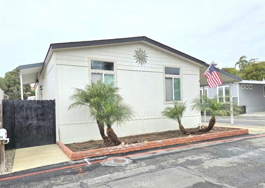 Only 1 block from the OCEAN on a corner lot!!! 3 bedrooms and 2 baths. This Awesome house is in the lovely, “Huntington Shorecliffs” Community… look no more! Walk to the beach in 3 minutes!!! Gorgeous open floor plan, with giant living and dining room. This beautiful home is 1,196 sq ft and is light and bright. Included with home: refrigerator, washer and dryer, dishwasher, stove and 1 year home warranty!!! Central Heating and a giant private back yard. Soft close cabinets. Extended driveway will fit two to three additional cars. Guest parking is also available. The monthly park lease is only $2,997.00 a month which includes access to the community clubhouse, dog park, and pool. All located in the park’s private community down the street from the Pacific Ocean and down the street from the famous Huntington Beach Pier and "Pacific City" with new shops and restaurants.
