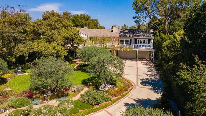 Embraced by .72 enchanting acres in Pasadena's South Arroyo, this Monterey Colonial masterpiece blends timeless elegance and modern luxury with immaculately landscaped grounds that earned it a Golden Arrow Award from the Pasadena Beautiful Foundation. The 8,900 sq ft estate showcases 5 bedrooms, all upstairs, plus 6 bathrooms, abundant storage, and 4 private balconies overlooking a terraced patio and pool yard with over a dozen fruit trees, berry bushes, gated motorcourt and 3-car garage. Inside, an airy 2-story foyer reveals formal dining and living with a fireplace, each swimming in natural light. The gourmet kitchen boasts a breakfast nook, butler's pantry and top-of-the-line appliances, while a second fireplace family room and brilliant sunroom offer endless opportunity to wine, dine and regale your guests. Extensive built-ins are displayed throughout, including in the fabulous game room with skylight and full bath, leading to a large gym/multipurpose room with vaulted ceilings. An upstairs sitting area proceeds to 5 bedrooms with large walk-in closets and 3 en-suite baths, a hall bath with balcony, and an office and laundry. The lavish primary suite features windows on 3 sides, vaulted ceilings, private fireplace and balcony, and a decadent bath with a huge dressing room closet. Unwind in the pool and entertain in ultimate luxury, all secluded by the award-winning surroundings of this pristine Pasadena retreat. Come see it for yourself, call today for a tour!