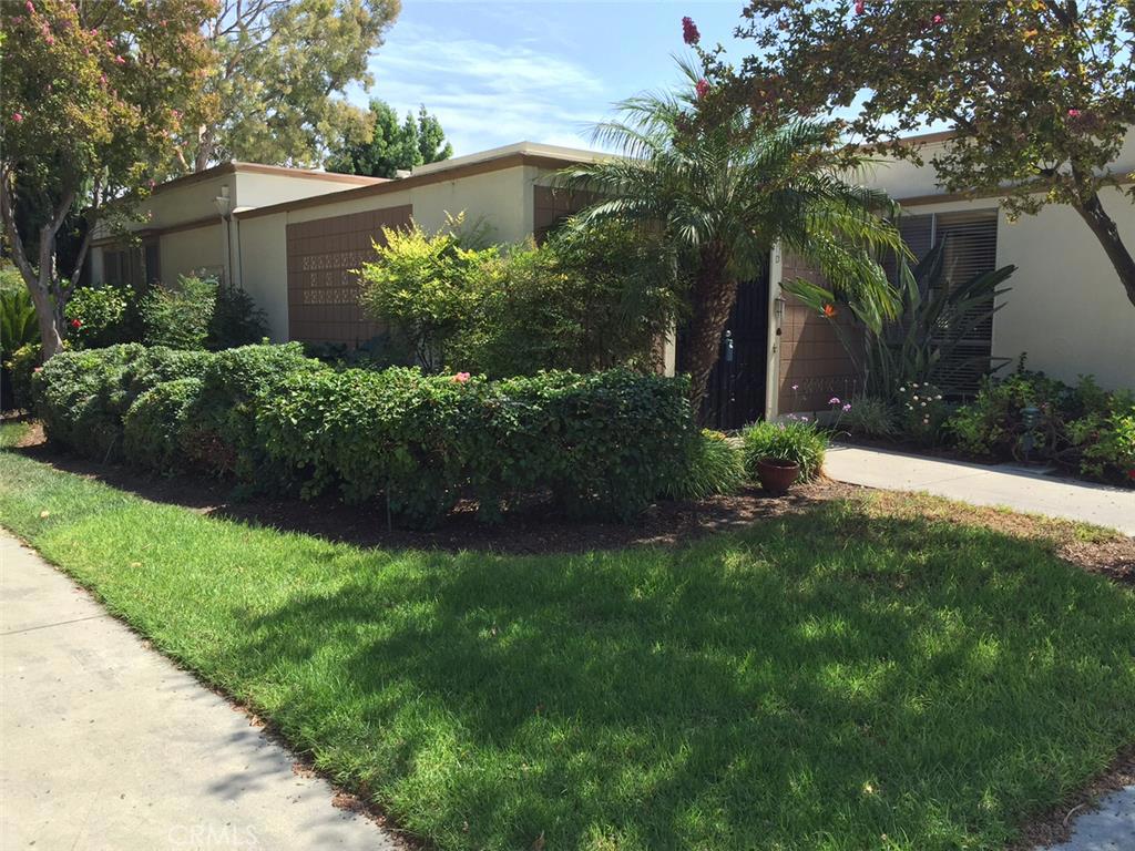 Very popular Madrid unit with loads of privacy and very close to carport parking. End unit with no one above or below and NO STAIRS. Lots of light from center open atrium which can be used for entertaining, pets or quiet enjoyment. Front patio has been converted to large family room (can also be third bedroom) for lots of additional space with built in closets for extra storage. Classic parquet floors throughout main living area with linoleum in kitchen, bath and guest bedroom. Carpeting in family room and master bedroom. Heat pumps in living area and family room; stacked washer /dryer in closet in bathroom. This unit is located in the 55+ resort community of Laguna Woods--Orange County's best kept secret. Surrounded by shopping, medical facilities and close to freeways! It's only a short distance to beautiful Laguna Beach with art galleries, shops galore, great restaurants and miles of beaches to stroll, jog and explore. This unit is sparkling clean and ready for your personal touch and imagination!