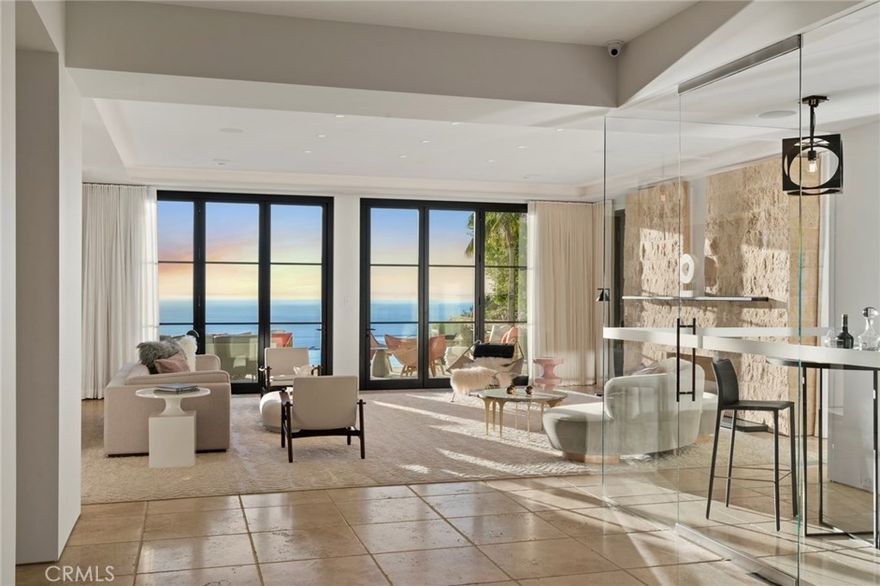 Dramatically positioned along Pelican Crest&#8217;s prized front row, 10 Channel Vista presents a refreshing modern aesthetic rarely available in the community. A comprehensive $6M renovation completed in December 2017 appointed the home with an assortment of sophisticated design elements, including white oak & travertine flooring, light fixtures & chandeliers by Apparatus & Ladies & Gentlemen, & SubZero appliances throughout. The home&#8217;s unique orientation offers the region&#8217;s best view perspective, encompassing the ocean, Catalina Island, Harbor, city lights, Palos Verdes, Pelican Hill Golf Course, & crashing waves. The eminently liveable floorplan spans 3 levels and is host to 5 bedroom suites, open social spaces, home office (possible 6th bedroom) with views & balcony, temperature-controlled wine and cigar room, home spa with heated floors, a steam room, and quick-fill tub, home gym, & chic master suite with frameless, stand-alone shower, his & hers closets, & sprawling ocean views. The rear yard is an entertainer&#8217;s paradise with infinity-edge pool & spa, fireplace, built-in BBQ, putting green, lawn, and covered outdoor dining area. An 8-car subterranean garage & fully integrated Savant system complete this one of-a-kind residence. Residents of Pelican Crest enjoy 24/7 guard-gated patrolled security, swim, tennis & playground amenities of the Newport Coast Community Center & close proximity to the pristine beaches, world-class shopping & dining, & John Wayne Airport.
