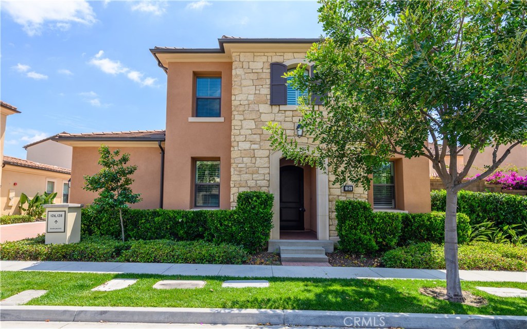 This home features a FIRST FLOOR MASTER BEDRROM. Gorgeous 4 bedroom 2.5 bath home! Brand new luxury vinyl through the whole house. The French style exterior gives way to the modern, open layout of the interior. The street level entrance leads past a bedroom/den and stairs. It opens up into the light filled great room containing the kitchen and living room areas. A stacking door spans the entire length of the living area and provides ample light and space for entertaining or just to let in the amazing California weather! The master suite, laundry and guest powder room complete the downstairs. Two more bedrooms and the 2nd full bath are located on the 2nd level. This beautiful home has an attached 2 car garage and is located on a corner lot. Refrigerator, dishwasher, window coverings, washer, dryer and microwave are included.