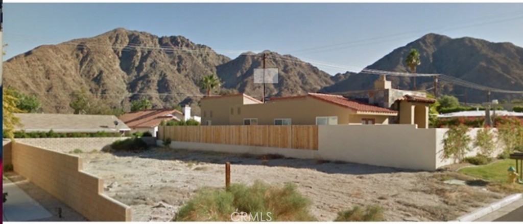 A great property in La Quinta Cove, nestled along the Santa Rosa mountains, with 180 degrees beautiful mountain views. Lot size, 5,227 sq ft., is bigger than regular lot size in the cove. Walls already existing on two sides. One lot remaining in-fill lot on developed street. Located next to the corner house 52-990 Avenida Villa. Very nice and friendly neighborhood with nice homes such as Contemporary, Santa Fe, or Mediterranean style home. No Homeowner’s Association fees. Clear skies for star gazing in your spa. (College of the Desert, 10 miles from the property offers Astronomy classes). Property is less than a mile from the Bear Creek Canyon Trail and Park. It is one block to access concrete bike trail going up to the Bear Creek Canyon Trail and Park. Drive nearby to Hwy 111, which is a major road to Indio, Palm Spring, Palm Desert, and other cities where shopping, theaters, restaurants, entertainment centers and other need-based outlets abound. Multiple Arnold Palmer golf courses are nearby, including the Arnold Palmer Private Course at PGA West and the Arnold Palmer Classic Course at SilverRock Resort. Lot is ready to build your dream, vacation or Air-BnB house, or park your RV while you vacation in Palm Springs, go to Coachella Festival or remote work, which is a 2 hour-drive from Los Angeles County. All Utility hook ups in place, such as public sewer, electricity, water, and Internet. Buyer accepts responsibility for verifying all information, location, size, zoning, utilities and building requirements, etc. with City of La Quinta and Riverside County. Property sold as is.