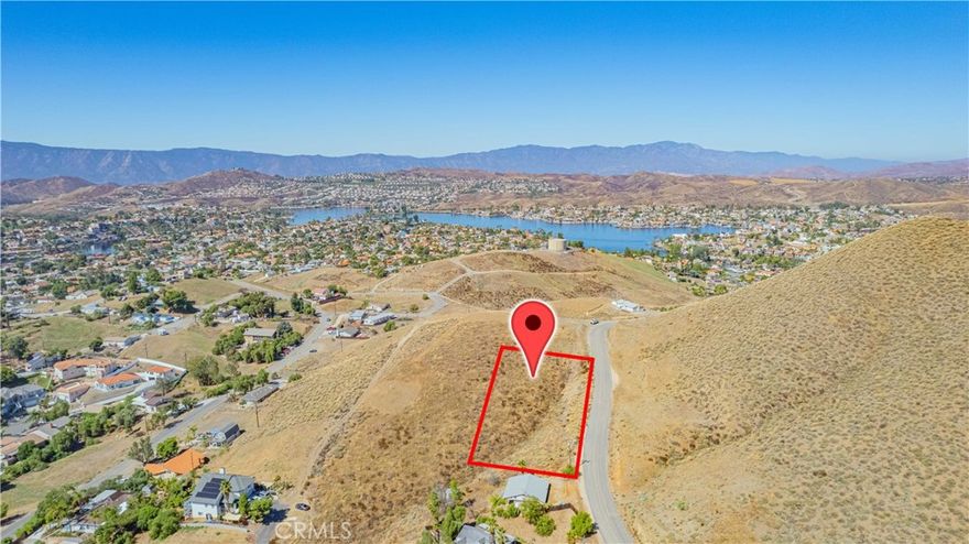 Two lots over a half acre for a great price located in the City of Menifee. Power line adjacent to property. City water and sewer is available with EMWD. Possible views of Canyon Lake. The second lot is 13,504 sq ft. Both lots combined total .63 acres. NO HOA and LOW TAXES. Come build your dream home!
