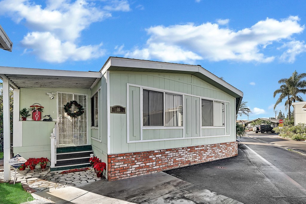 Photo 1 of 16 of 7887 Lampson Avenue 16 mobile home