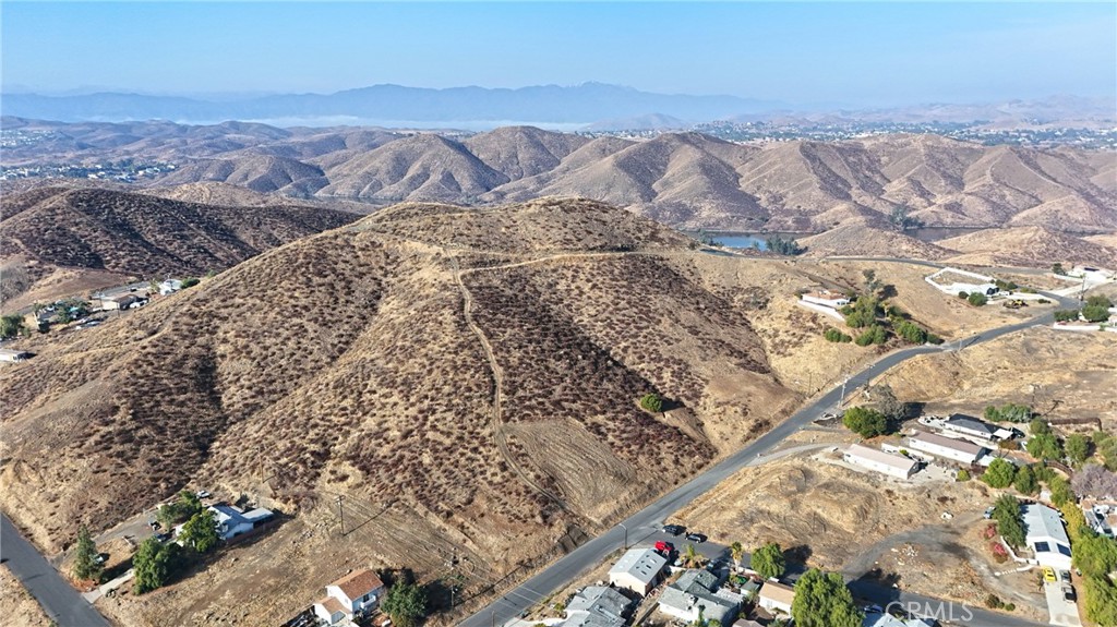 Wonderful opportunity to own .61 acres of residential land with VIEWS of Canyon Lake and Quail Valley communities.