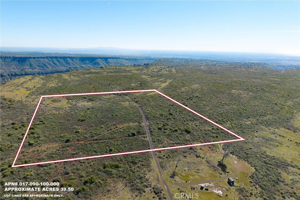 With stunning, panoramic views, this secluded, gently sloping acreage is a lovely place to build your dream home or set-up your perfect weekend get-away retreat! Wilder Rd is gated at Hwy 32 for added privacy and security and over 3 miles of the private road to the property is paved, making it a pleasant, less than 25-minute drive from Chico's city limits. This 39.5 acre property is part of the Buzztail Community Service District and could be connected to the deep, community well which is professionally operated by Del Oro. Some neighbors have opted to drill their own wells and go "off-grid" for the ultimate in self-sufficient living! Over the creek and through the scenic, foothill pastures you will go . . . to your own private oasis! The adjoining 39.42 acre property is also FOR SALE (Doe Mill APN017-090-105), so one could purchase both for enhanced seclusion and flexibility!