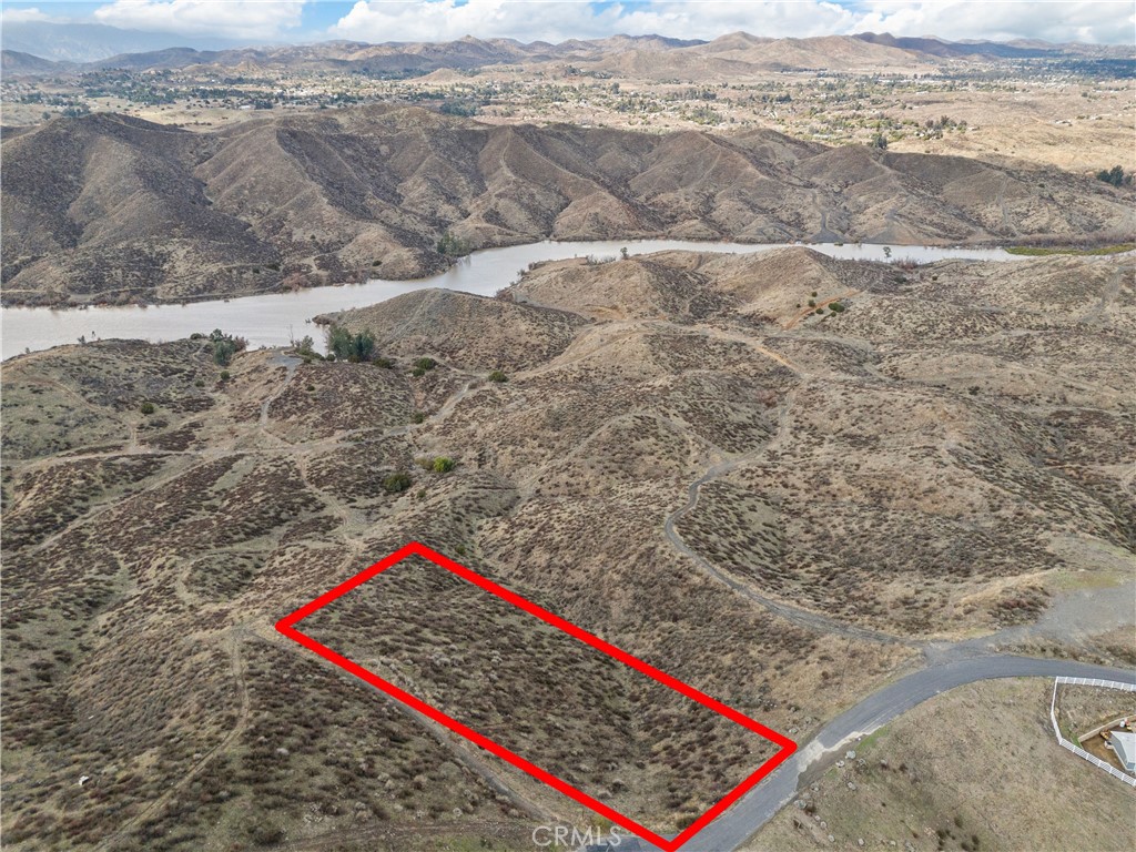 ****Price Reduced again, this is now the best priced parcel in the area****SELLER IS EXTREMELY MOTIVATED TO SELL, will consider ALL offers**** Here is your chance to have some of the most AMAZING views Southern California has to offer! If what you seek is PEACE and QUIET and TRANQUILITY, then this is the spot for you! This lot has so much potential to do what your heart desires, with the most UNBELIEVABLE views of the San Jacinto River that runs into Canyon Lake, hike on your own property, build a home or just enjoy the quiet being away from the city. This lot is on a CUL-DE-SAC and also a PAVED ROAD, what an amazing opportunity, please don't miss this one!!