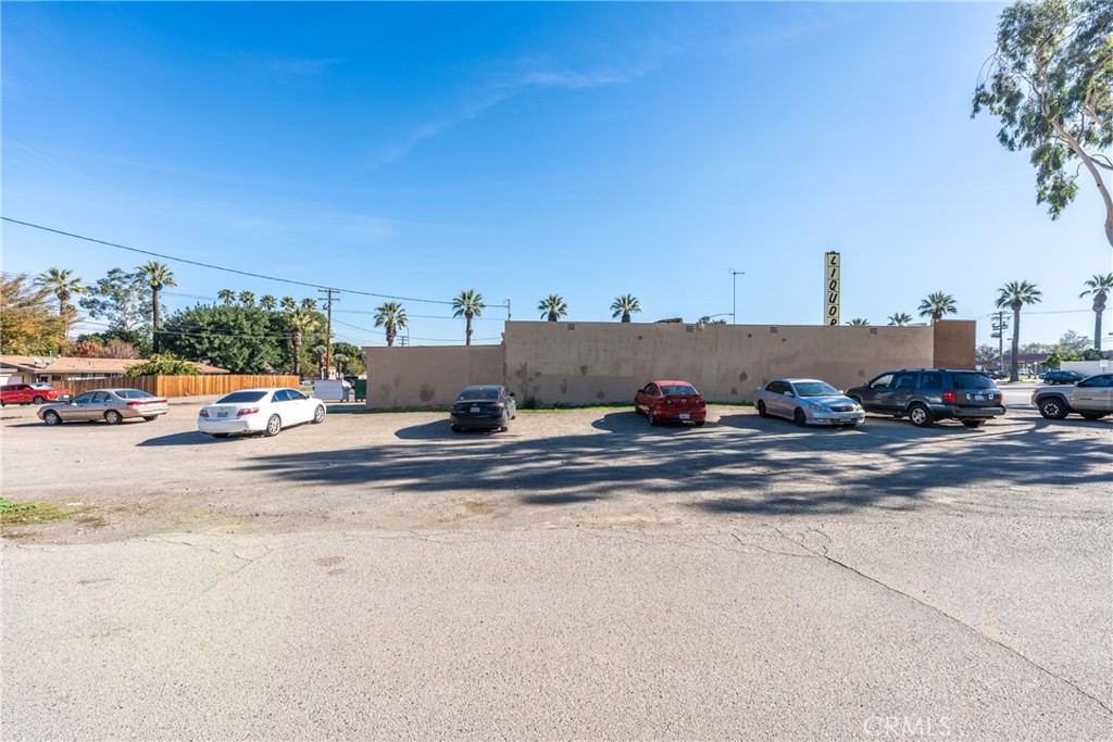Huge potential with this lot facing 6th street. Commercial zoning very high traffic near light signals on Grand and 6th. Commercial lots are hard to find in the city of Corona. Please check with city what can be done with this lot.