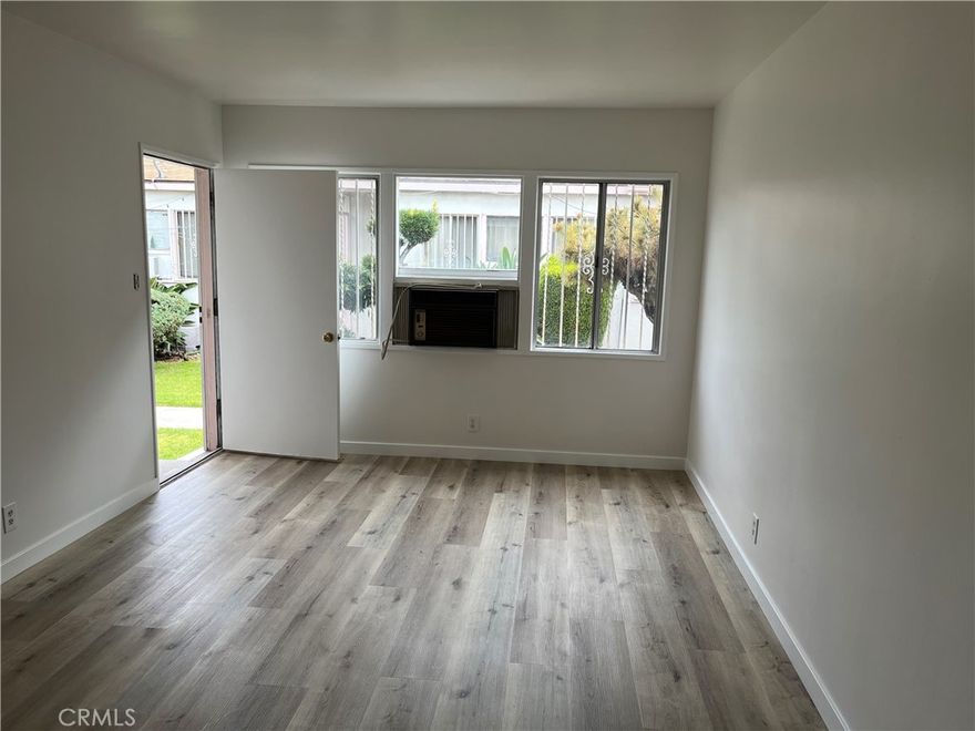 Don't miss out on this beautifully updated apartment with the added convenience of a garage.  Recently renovated one bedroom apartment available, The apartment features include, New pained, New floor, includes a garage for parking or storage, stove and wall air unit.  Don't miss out.