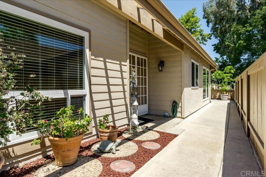 Beautiful Single-Story Home with Greenbelt Views. This home features an open floor plan, vaulted ceilings, natural light and views. Updated kitchen with dinette area opens to your patio. Vinyl windows and sliders. Large master suite with walk in tub, dual vanities, and lots of storage. Optional 3rd bedroom/office makes for the perfect work/home flex space. Easy care flooring as home was upgraded to accommodate needs of someone with a disability. Move in ready.