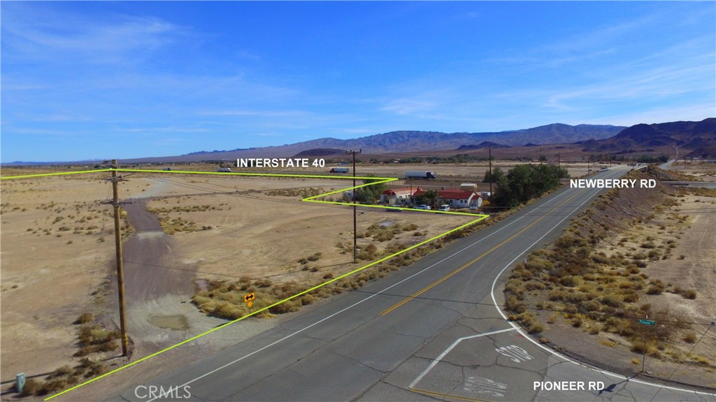 ***Come VIEW and MAKE an OFFER TODAY! Affordable COMMERCIAL LAND OPPORTUNITY located in expanding Newberry Springs CA. The 33.99 ACRE PARCEL is zoned CG-SCp (General Commercial - Sign Control Primary) which allows for many different commercial/renewable energy uses including the possibility of installing billboard signage along the southern boundary which runs adjacent to VERY HIGH TRAFFIC Interstate-40. In addition to frontage along the interstate, the nearly 1.5M square-foot lot has approximately 800 feet of paved access frontage along Newberry Rd, and approximately 1300 feet of RAILROAD frontage along the northern boundary which could be suitable for a shipping RAIL SPUR. Not to mention, the site is only a few blocks away from the Interstate 40/Newberry Rd exit and is about 15 miles away from the Interstate 15/Hwy 58 interchanges offering excellent access to pretty much all of Southern CA. Plus the property is adjacent to utility lines. With huge companies like PG&E, BNSF, and the US Military expanding their activities nearby, this property is ideal for any savvy real estate investor or anyone looking to grow their business in order to accommodate the influx of logistical operations coming to the area. A definite MUST SEE OPPORTUNITY worthy of serious consideration before it's too late! ***