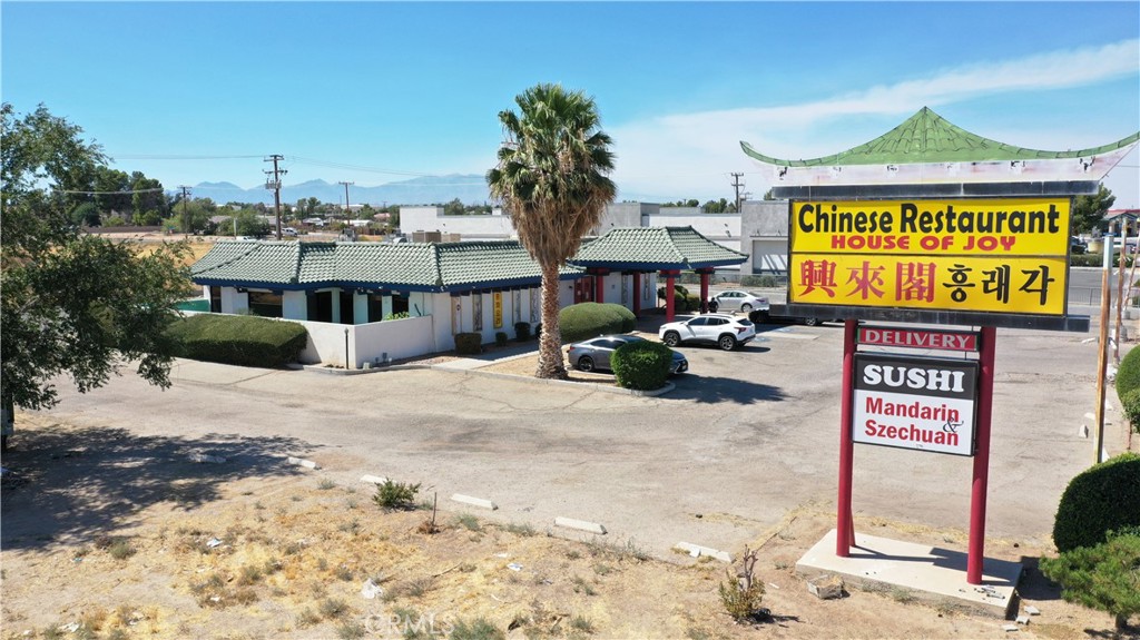 Proud to present 14745 Palmdale Rd, in a prime location and value add restaurant in Victorville, CA which is the pride and heart of the city. The property is a hard-corner lot property on a major corner Palmdale Road and Del Gado Road, arguably one of the busiest streets in Victorville, CA. The building is surrounded by several major retailers and blended with modern conveniences and strategically located along a busy route frequented by travelers between Los Angeles and Las Vegas. The property is situated in the core of retail and restaurant row and thus has ample vehicle traffic while providing a sophisticated environment with spectacular desert views that you won’t find anywhere else in Southern California.
The Chinese influence designed building that was built in 1983 and has been remodeled since. When the owners bought the property, they renovated the entire restaurant and added many new & high-end amenities include a brand-new bar, two twelve type II hoods, and other equipment. The property is situated on a massive ±39059 SF lot zoned C-2 (buyer to verify) which provides at least 50+ spaces (2-Handicap Spots) of ample parking. The intent of the C-2 neighborhood commercial zone is to provide centers for convenience shopping in residential neighborhoods, planned and controlled to the extent that any such center will perform a vital service to the neighborhood in which it is located.
The property is uniquely designed with huge front of the house and back of the house space. The restaurant is currently operated as a Chinese food and Sushi Restaurant which has been running continuously for over 20 years and can occupy 100+ people. When the new owners purchased it, they spared no expense with the upgrades including the best of high-end kitchen equipment, a noodle maker, walk-in coolers and freezer, two twelve foot hoods, fryers, wok burners, and liquor license 47 which will be included with the purchase price. This provides the new owner the opportunity to expand the business. The space has an open concept with great design and features a sushi bar area and a classic bar space that was built to be a full-service bar. The ground floor has two bathrooms and an ample walk-in freezer and cooler. The overall feel of the place is very charming.