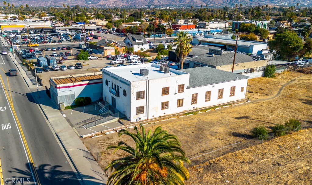 This property includes 2 adjacent lots, total of 3 parcels, totaling approximately 30,000 sq. ft. of land, and is currently used as a church with seating for 180. It features a recently updated roof, new plumbing in the kitchen and bathroom, brand-new carpets in the upstairs offices, and replaced drywall throughout. With ample space and significant potential for expansion, this property is perfect for continuing its current use or repurposing for other allowed community/zoning options. The large, versatile layout and solid foundation offer numerous possibilities for future growth and development.
