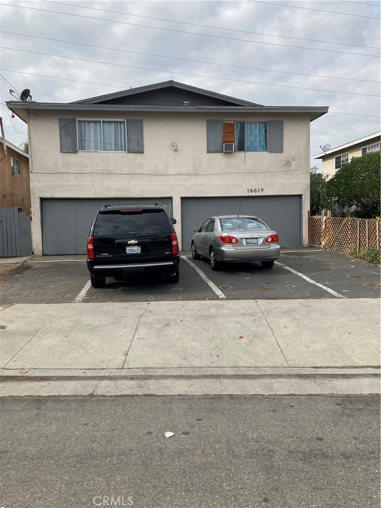 NEW INCREASED RENTS ...4 Units (1) Townhouse Style Unit with 2 bedrooms, 1 1/2 Baths and Private Back Yard! Perfect for Owner Occupied. (3) 1 bedroom 1 Bath Units... 4 Enclosed Attached Garages With additional off street parking.